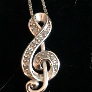 Sterling silver Treble clef necklace.